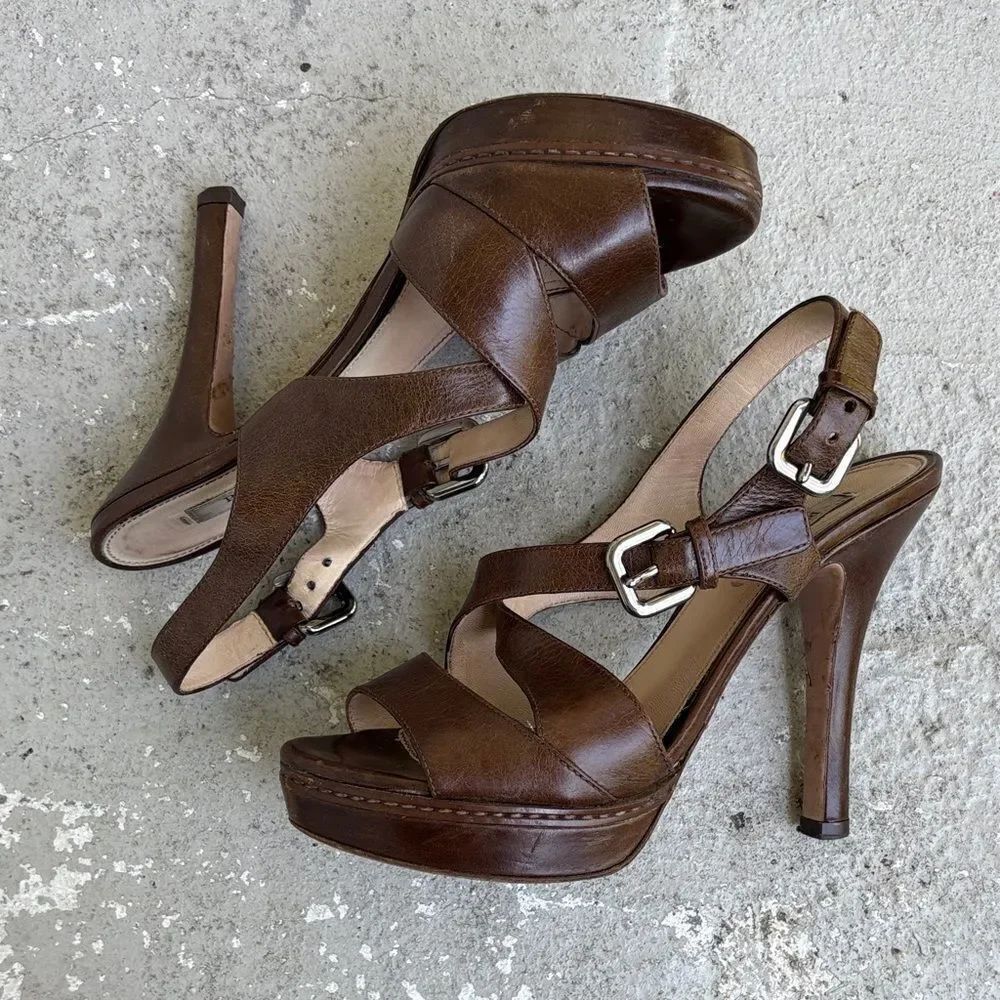 Prada crisscross open toe platforms